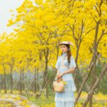 woman-yellow-flowers